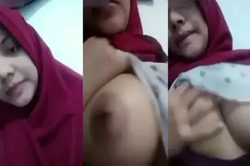Ukhti Jilbab Merah Pamer Toket Gede Bikin Sange